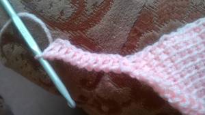 Yarn over and pull through two loops. Repeat this for all loops on hook.
